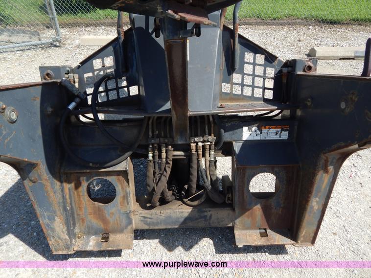 image for item AE9835 Bobcat 709 backhoe attachment