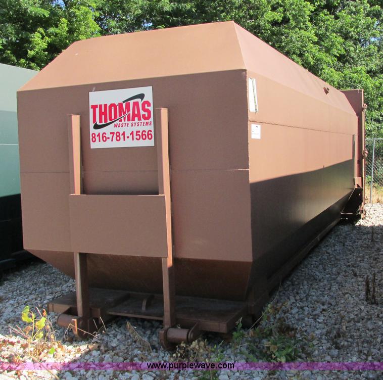 image for item F5137 2002 McClain Ez-Pack roll-off container