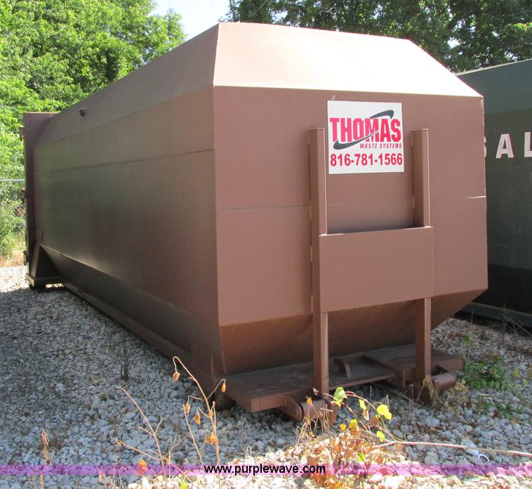 image for item F5137 2002 McClain Ez-Pack roll-off container