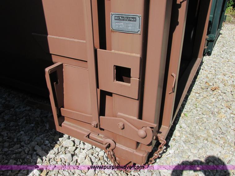image for item F5137 2002 McClain Ez-Pack roll-off container