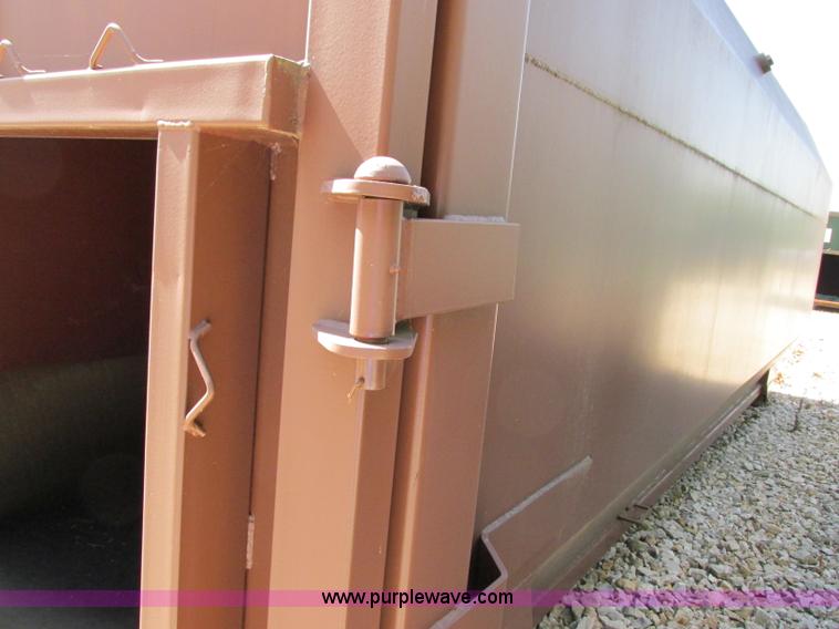 image for item F5137 2002 McClain Ez-Pack roll-off container