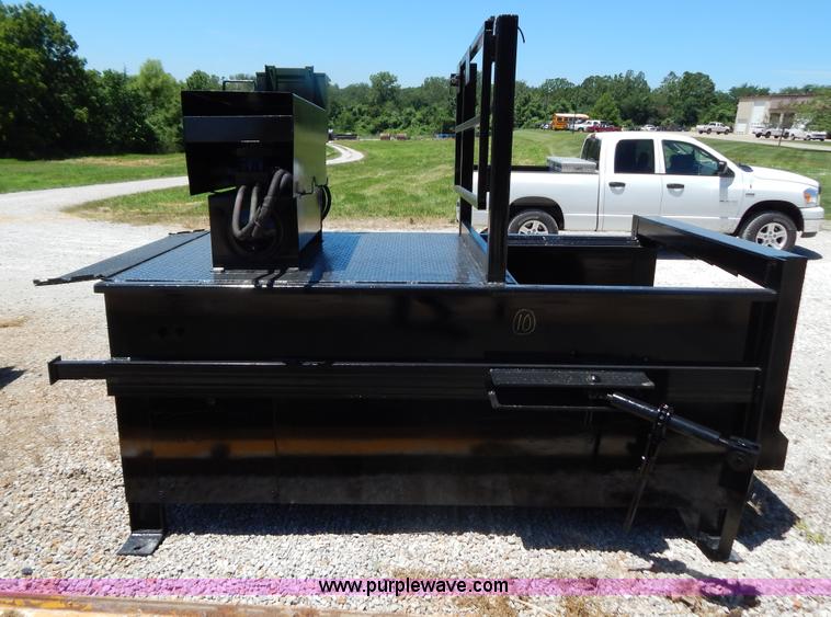 image for item F5143 McClain CM-200 stationary compactor