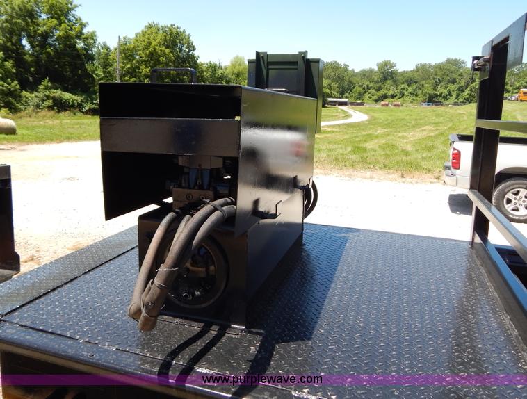 image for item F5143 McClain CM-200 stationary compactor