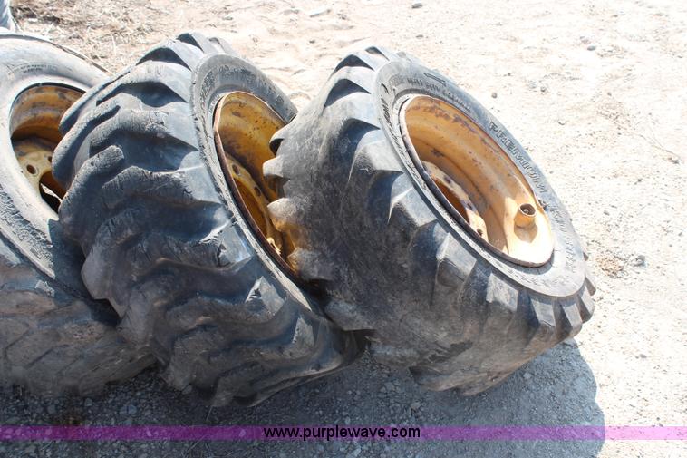 image for item AU9168 (7) skid steer tires and wheels