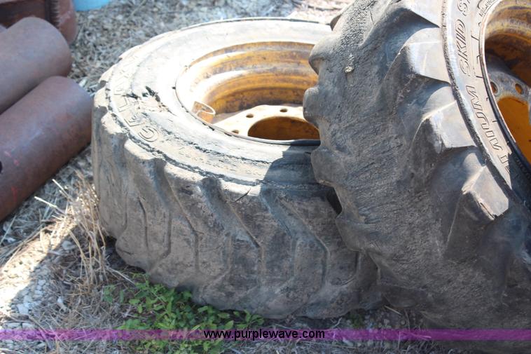 image for item AU9168 (7) skid steer tires and wheels