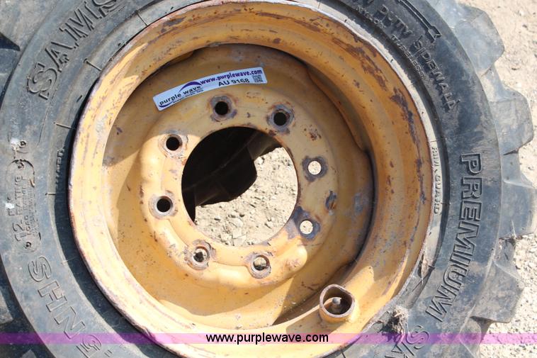 image for item AU9168 (7) skid steer tires and wheels