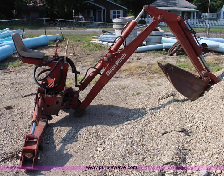image for item AU9178 Ditch Witch 140 backhoe attachment