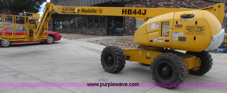 image for item D7425 2003 Haulotte HB44J rough terrain telescopic manlift