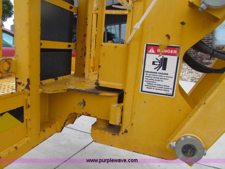 image for item D7425 2003 Haulotte HB44J rough terrain telescopic manlift