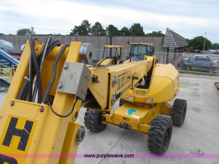image for item D7425 2003 Haulotte HB44J rough terrain telescopic manlift