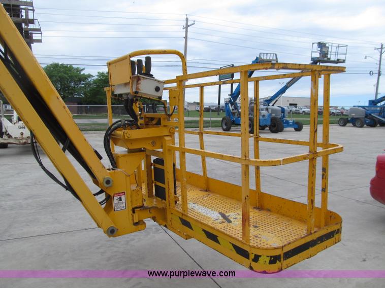 image for item D7425 2003 Haulotte HB44J rough terrain telescopic manlift