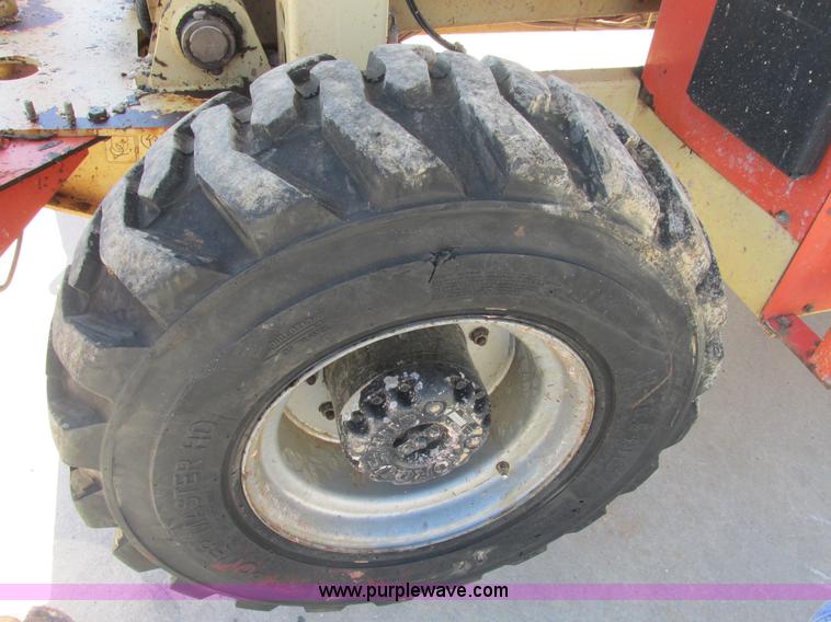 image for item E7272 JLG 500RTS rough terrain scissor lift