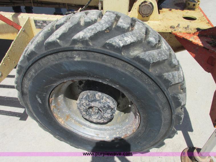 image for item E7272 JLG 500RTS rough terrain scissor lift