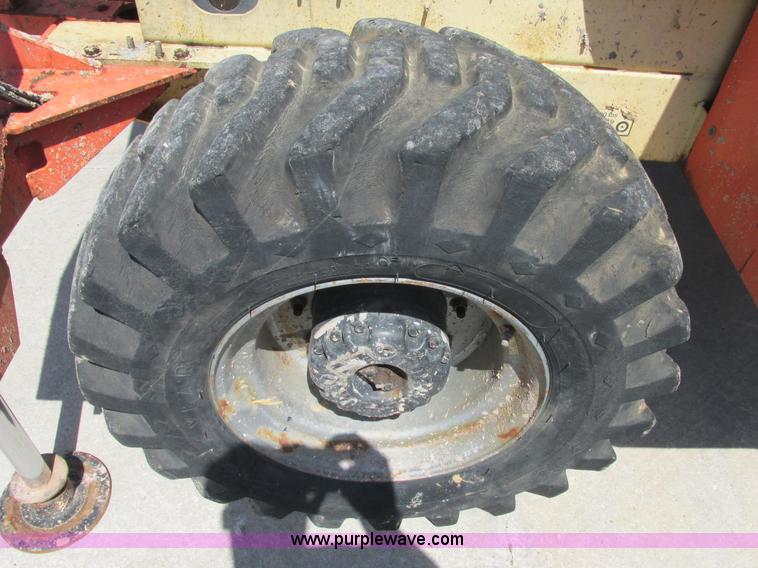 image for item E7272 JLG 500RTS rough terrain scissor lift