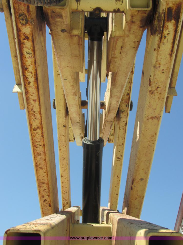 image for item E7272 JLG 500RTS rough terrain scissor lift