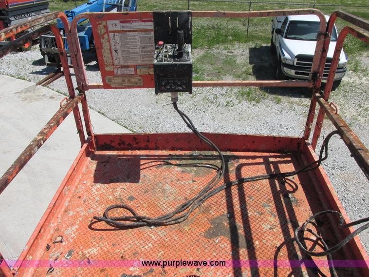 image for item E7272 JLG 500RTS rough terrain scissor lift