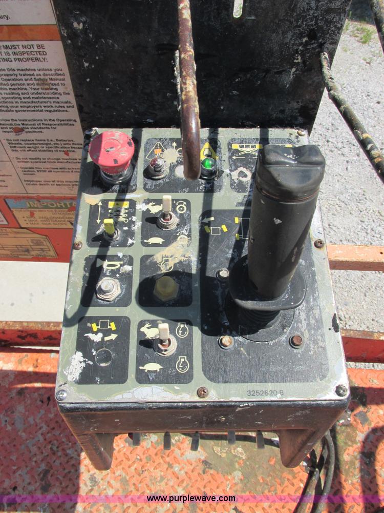 image for item E7272 JLG 500RTS rough terrain scissor lift