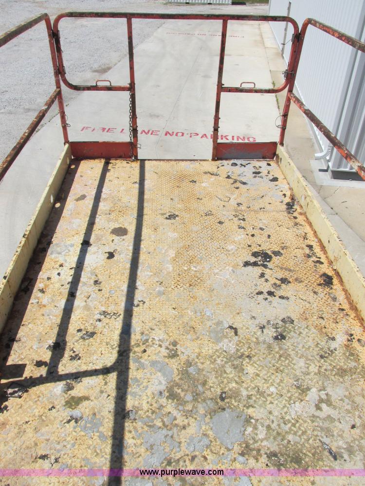 image for item E7272 JLG 500RTS rough terrain scissor lift