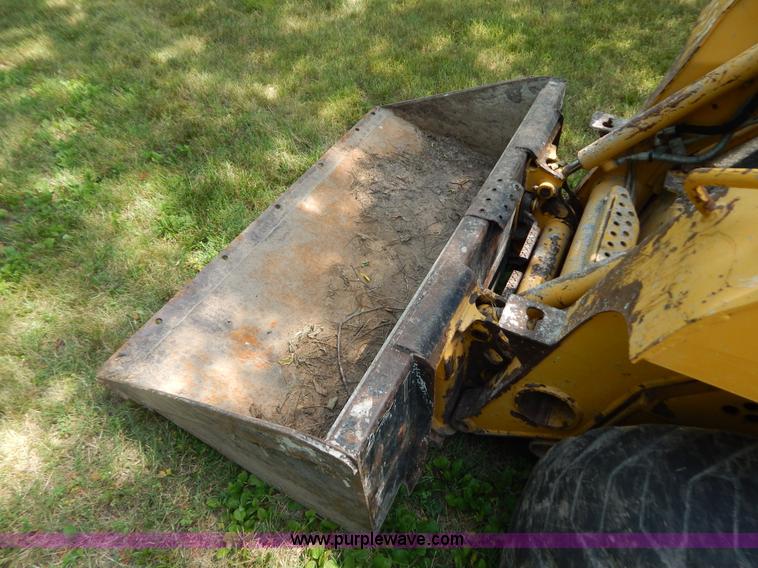 image for item F4019 2000 John Deere 240 skid steer