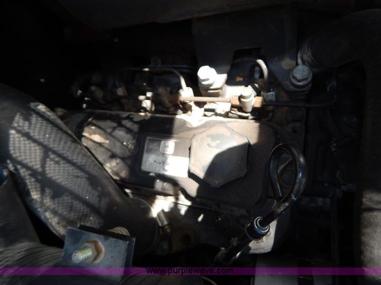 image for item F4019 2000 John Deere 240 skid steer