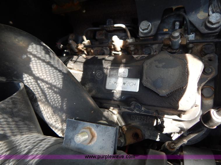 image for item F4019 2000 John Deere 240 skid steer