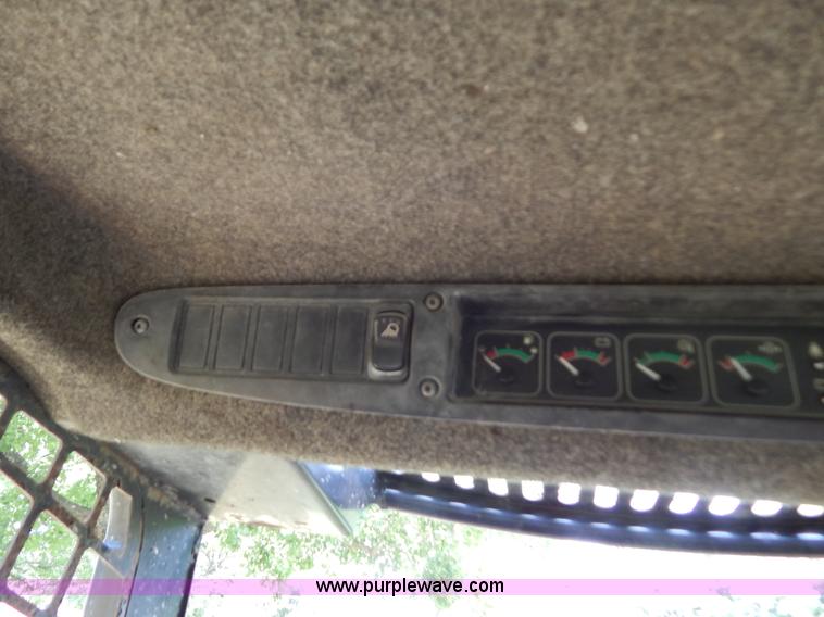 image for item F4019 2000 John Deere 240 skid steer