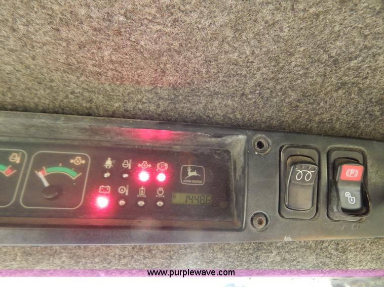 image for item F4019 2000 John Deere 240 skid steer