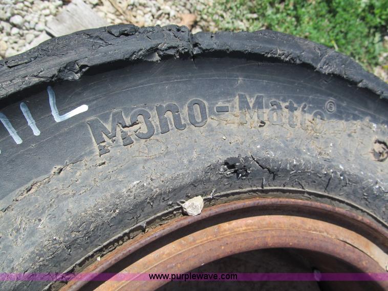 image for item F5093 (4) solid skid steer tires and wheels
