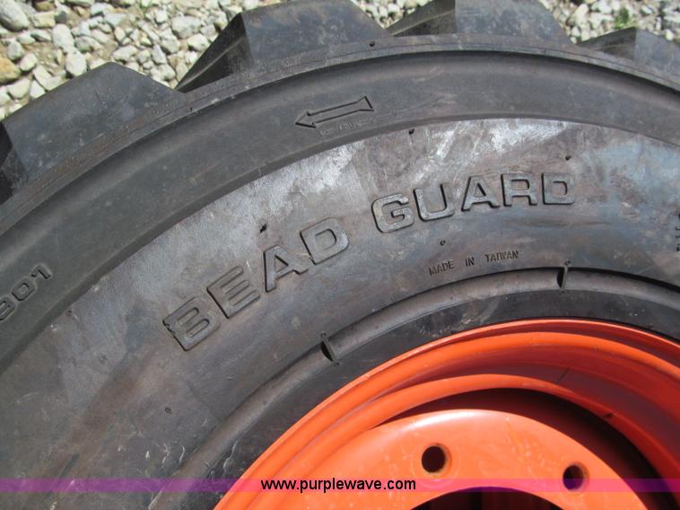 image for item F5094 (4) 12-16.5 skid steer tires and wheels