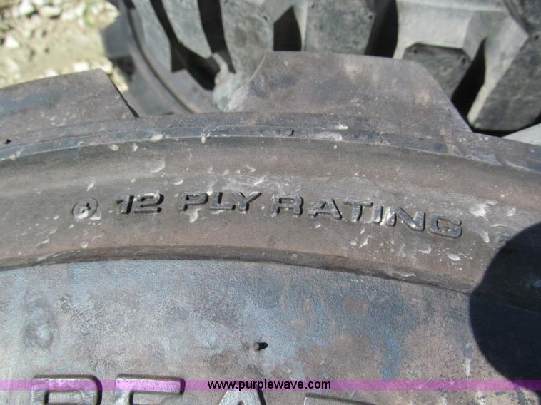 image for item F5094 (4) 12-16.5 skid steer tires and wheels