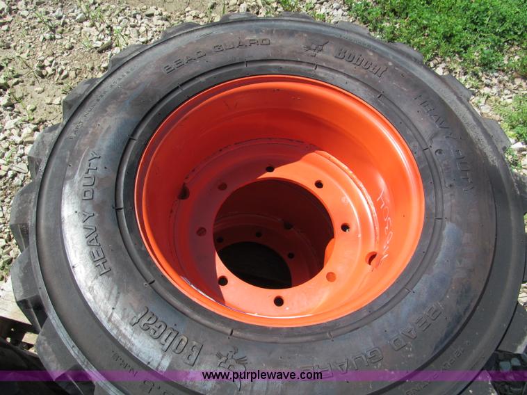 image for item F5094 (4) 12-16.5 skid steer tires and wheels