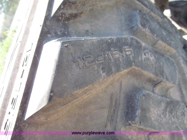 image for item F5094 (4) 12-16.5 skid steer tires and wheels