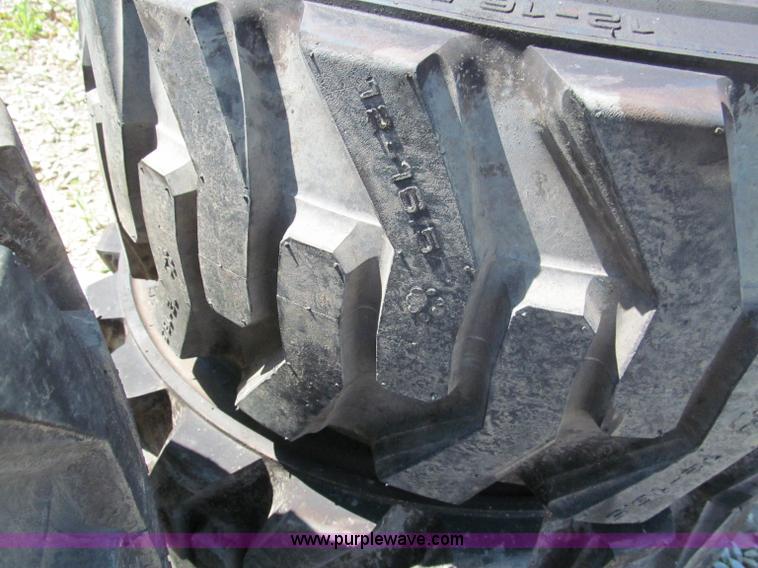 image for item F5094 (4) 12-16.5 skid steer tires and wheels