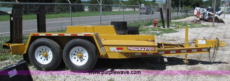 image for item F5104 2011 Towmaster T10P skid steer trailer