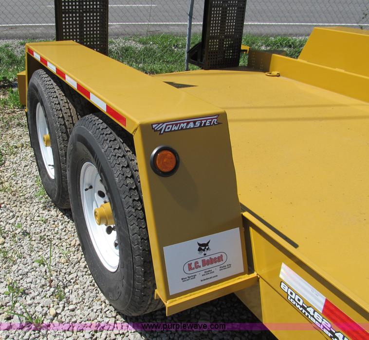 image for item F5104 2011 Towmaster T10P skid steer trailer