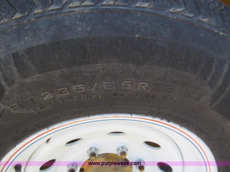 image for item F5104 2011 Towmaster T10P skid steer trailer