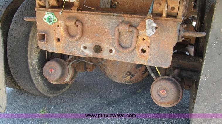 image for item G2022 1999 International 4900 dump truck