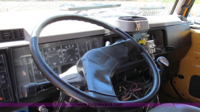 image for item G2022 1999 International 4900 dump truck