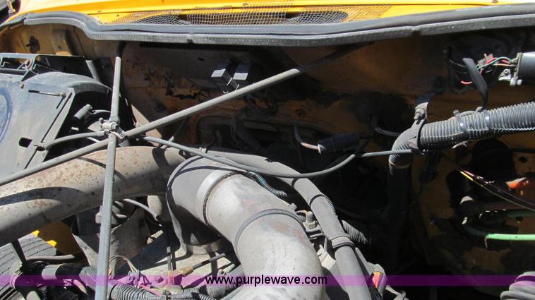 image for item G2022 1999 International 4900 dump truck