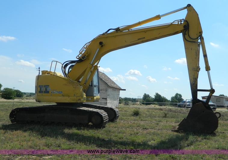 image for item G7899 1999 Komatsu PC228USLC-1 excavator