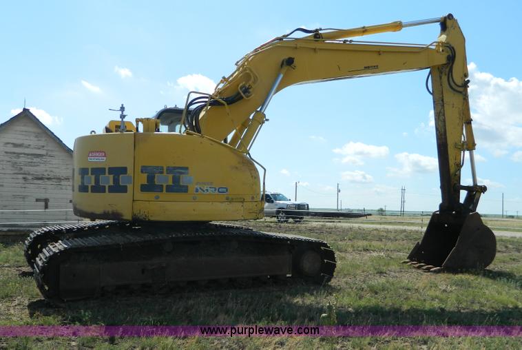 image for item G7899 1999 Komatsu PC228USLC-1 excavator