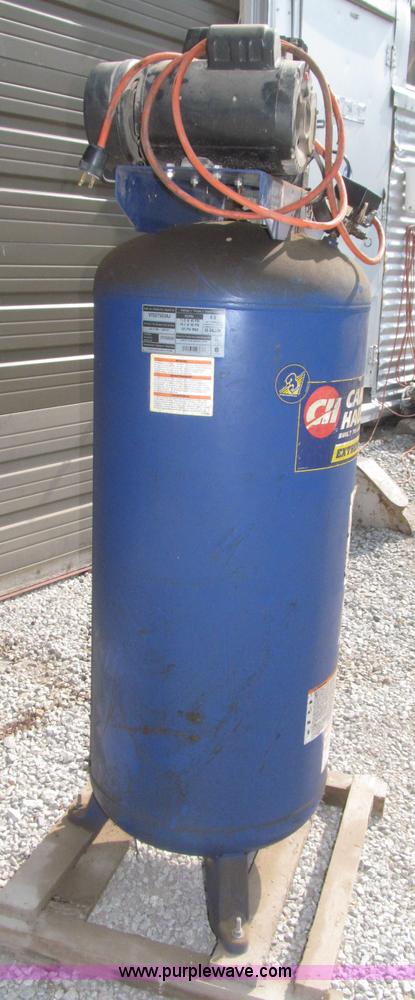 image for item K9727 1999 Campbell Hausfeld 60 gallon vertical air compressor