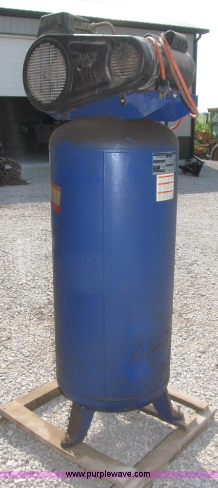 image for item K9727 1999 Campbell Hausfeld 60 gallon vertical air compressor
