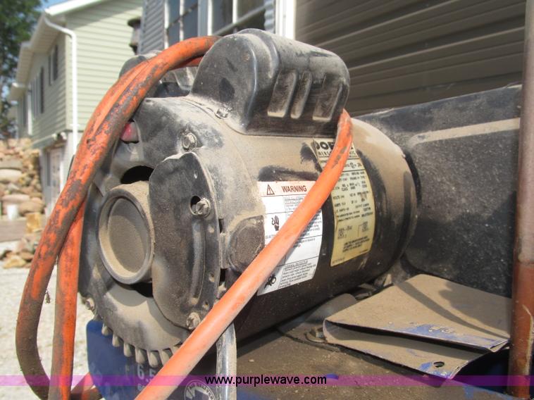 image for item K9727 1999 Campbell Hausfeld 60 gallon vertical air compressor