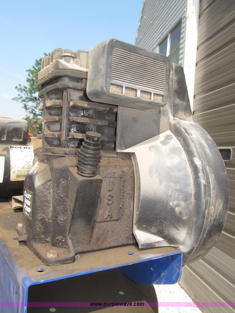 image for item K9727 1999 Campbell Hausfeld 60 gallon vertical air compressor