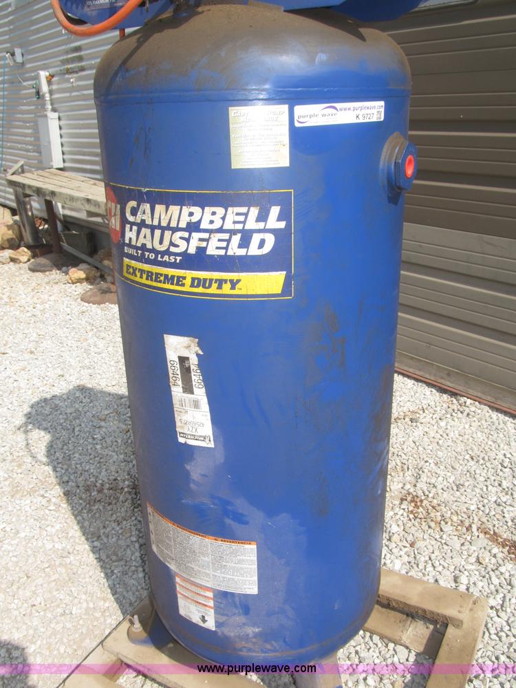 image for item K9727 1999 Campbell Hausfeld 60 gallon vertical air compressor