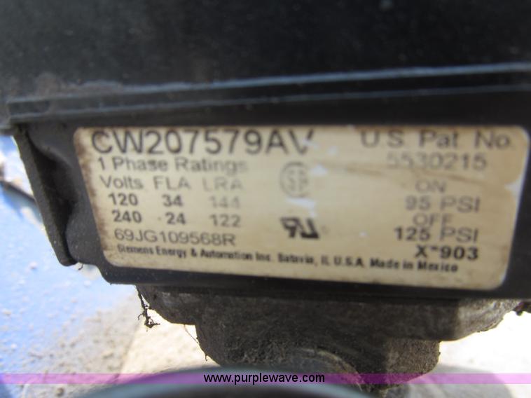 image for item K9727 1999 Campbell Hausfeld 60 gallon vertical air compressor