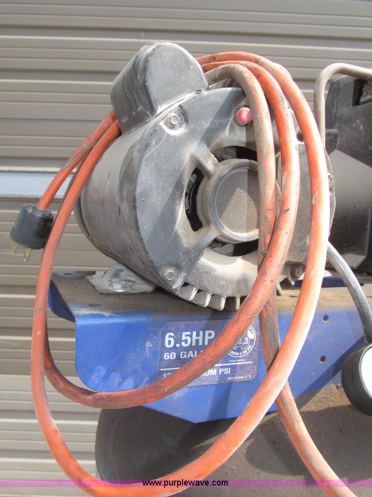 image for item K9727 1999 Campbell Hausfeld 60 gallon vertical air compressor