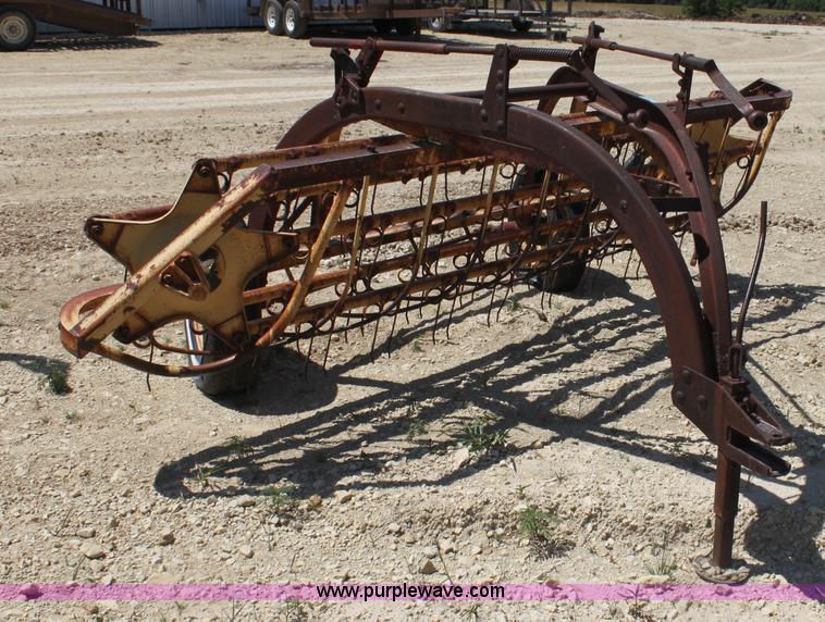 image for item AE9150 New Holland 56 side delivery rake