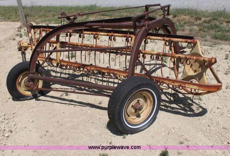 image for item AE9150 New Holland 56 side delivery rake